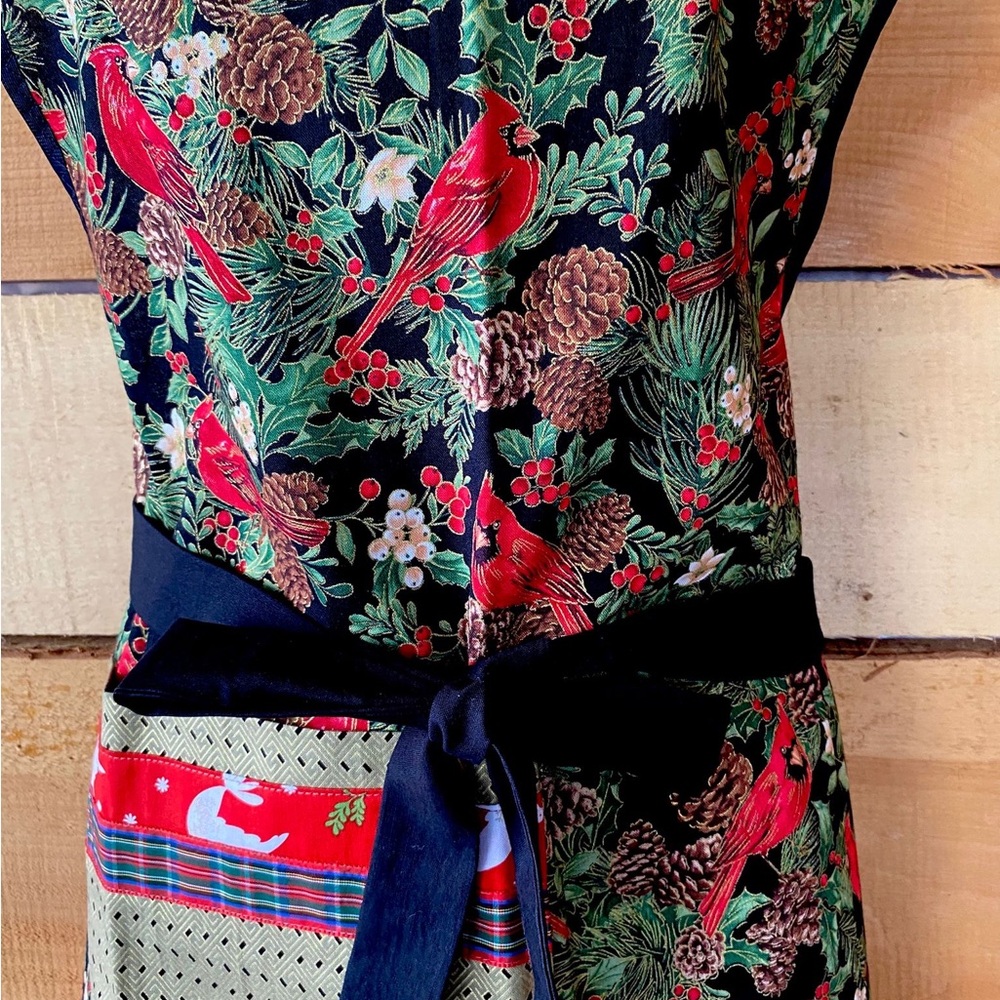 Handmade. Brand new Cardinal and Pinecone Print Apron. Christmas Apron